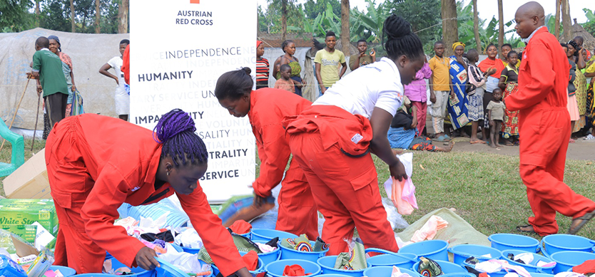 URCS Volunteers assemble Menstrual Hygiene Kits before distribution to DRC refugee women and girls in Bundibugyo district