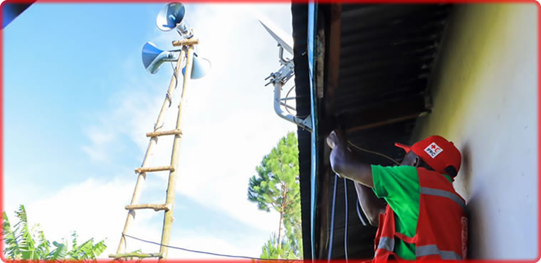 URCS technicians setting up one of the community radios in Kasese District.
