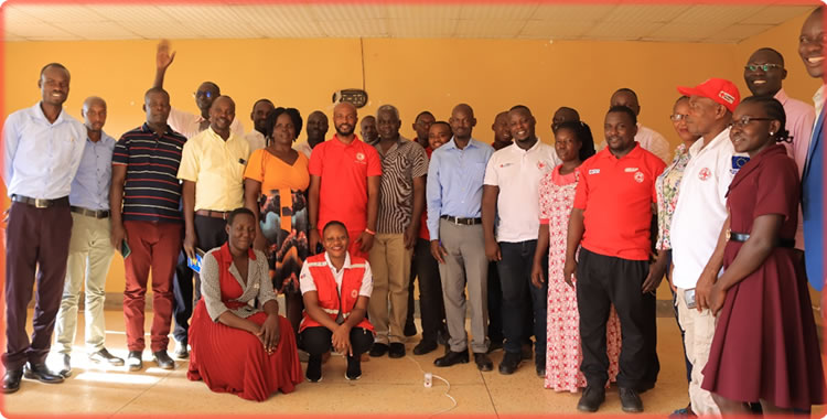 Participants of the operationalization training for the Amolatar district contingency plan for disaster preparedness and response pose for a photo
