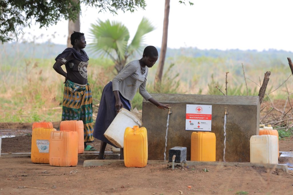 One of the refugee girls fetching water from one of the tap stands in Bidi Bidi refugee settlement Zone iv annex, constructed by the Humanitarian Protection one project with funding from the Belgian Red Cross Flanders. 
